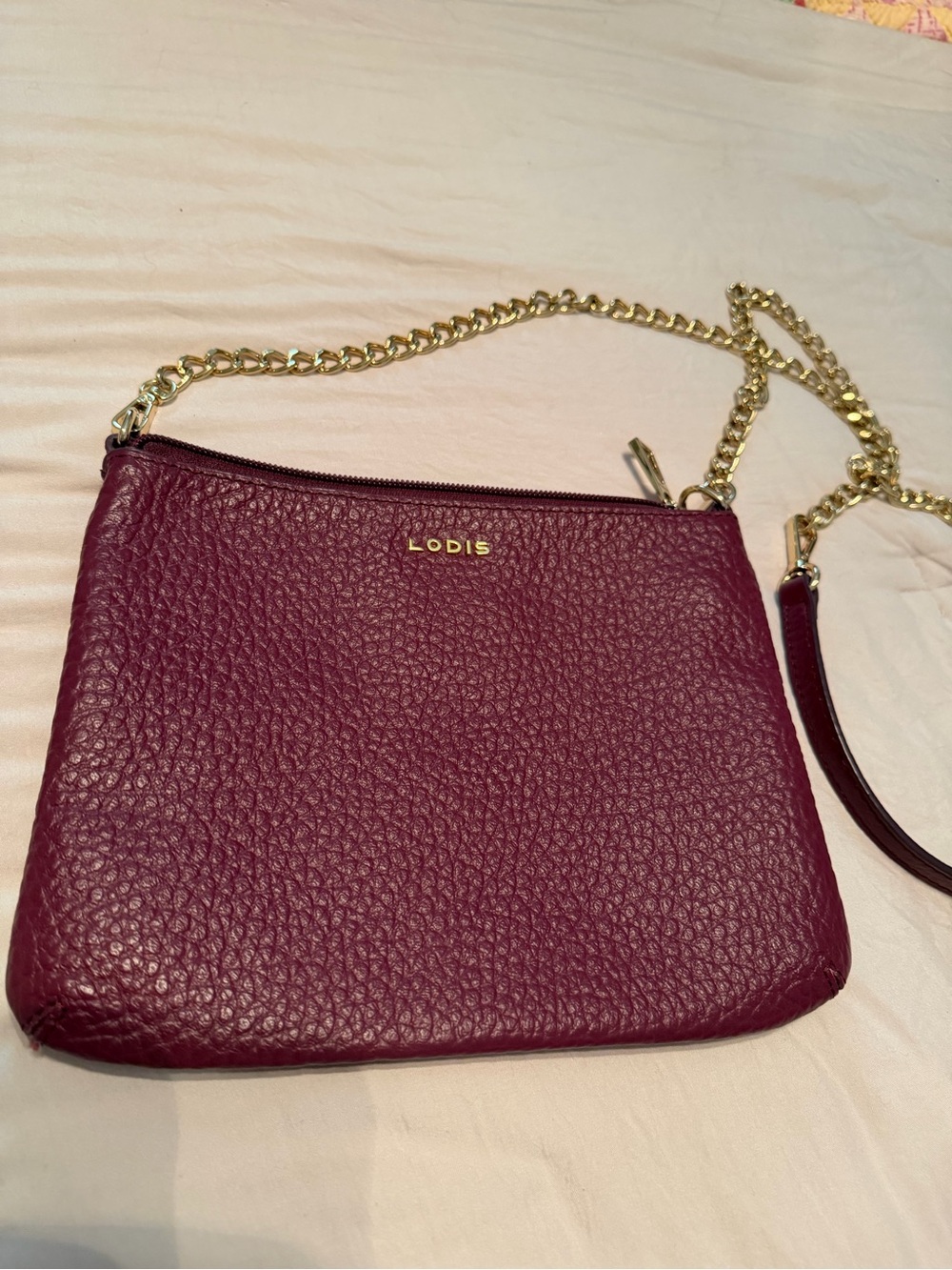 Lodis Pebbled Leather Crossbody in Plum with Gold Chain
